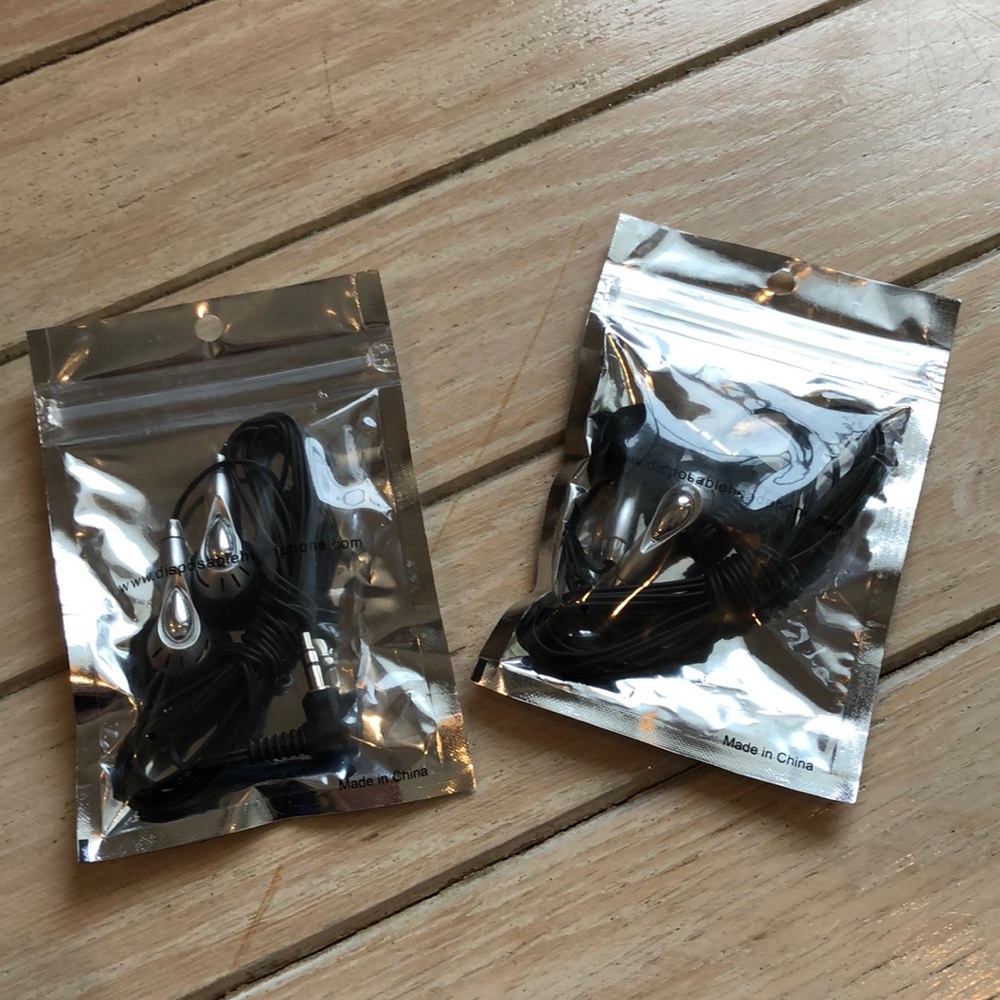 NWT  2 pairs of disposable earbuds